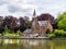 Castle della Faille along Minnewater lake in old town of Bruges, Belgium