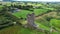 Castle Donovan, the remains of an Irish tower house in a valley near Drimoleague