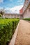 Castle gardens in front of Royal Castle in Warsaw, saxon facade Poland. Landscape design, park with shrubs and green lawns