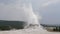 Castle geyser erupting in yellowstone national park