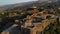 Castle of Gjirokastra and old city center. Aerial view of ancient fortress, houses and mountains in Gjirokaster, Albania