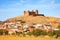 Castle on hill, Castillo de La Calahorra and village, Granada, A