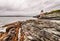 Castle Hill Lighthouse in Newport, Rhode Island, situated on a dramatic rocky coastline