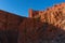Castle kasbah hotel on the high Cliff in amazing place at Picturesque Serpentine mountain road in Gorges Dades in high
