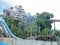 Castle Lion and Tiger Tower face in front of Themepark with beautiful sky