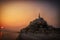 Castle Mont Saint Michel in Normandy, France at sunset