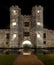 Castle at night with moat