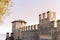 Castle in the north of Italy near the lake. Ancient castle and blue sky. Travel in Europe and tourism. Free space for text