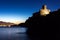 Castle on the sea at sunset in Italy