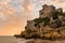 Castle of Tamarit seen from the beach on the sunset, Tarragona province, Catalonia, Spain