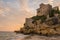 Castle of Tamarit seen from the beach on the sunset, Tarragona province, Catalonia, Spain