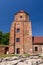 Castle in Toszek, a brick castle from the 15th century, partially reconstructed. View from the green courtyard to the building