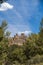 castle and wall of albarracin, historic Spanish village that overlooks the trees