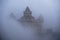 Castles covered with fog at the top of Bana Hills, the famous tourist destination of Da Nang, Vietnam. Near Golden bridge