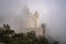 Castles covered with fog at the top of Bana Hills, the famous tourist destination of Da Nang, Vietnam. Near Golden bridge