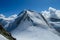 Castor summit on Monterosa traverse knife edge snow ridge glacier walk and climb in the Alps