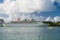 Castries, st.lucia - November 26, 2015: ships and motor boat in blue sea at tropical beach. Liner in harbor on cloudy sky. Luxury