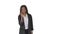 Casual African American Businesswoman talking on phone while walking on white background.