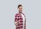 Casual Man Happy Smile Young Handsome Guy Point Finger At You Wear Checked Shirt Isolated
