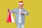 Casual styled funny middle aged man in red new year santa cap, e