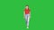 Casual woman walking and smiling on a Green Screen, Chroma Key.