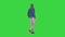 Casual young man walking on a Green Screen, Chroma Key.