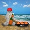 Cat ashen drinks beer with sausage on beach