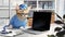 cat dressed as a doctor sits in a medical office.