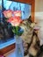 Cat and flowers, a gift for women for the holiday