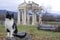A cat in front of Tetrapylon of Aphrodisias Ancient City, Aydin / Turkey