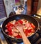 Cat helping with cooking