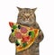 Cat holds piece of pizza