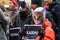 Cat masks on people faces with KARMA sign at hands, during `March for animals` in Riga, Latvia.