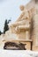 Cat next to the statue of the dramatist Menander at the Theatre of Dionysus Eleuthereus the major theatre in Athens and