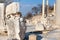 Cat on Roman stone columns and altar ruins room in ephesus Arch