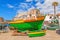 Cat shark drying at colorful fishing boat, Camara de Lobos, Madeira