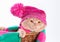 Cat wearing pink knitting hat