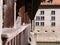 Cat on the wooden wall of the Bern Bridge in Fribourg, Switzerland.