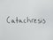 Catachresis - handwritten word on a white paper background