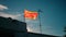 Catalan flag, Senyera, in closeup waving on a pole on a roof