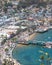 Catalina Island vacation resort, Avalon, California, aerial view of green pleasure pier, calm ocean bay view of colorful houses, b