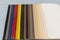 Catalog of multicolored imitation leather from matting fabric texture background