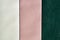 Catalog of white, pink, green imitation leather. Leatherette samples texture. Industry background