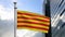 Catalonia flag waving in wind modern city. Catalan banner cloth texture blowing