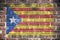 Catalonia independence flag on brick wall red yellow blue white star Estelada