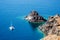 A Catamaran Anchored Off the Coast of Santorini, Greece.