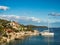 Catamaran docked in a bay with restaurant in Croatia at sunset, Kaprije island