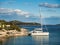 Catamaran docked in a bay with restaurant in Croatia at sunset, Kaprije island