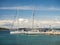 Catamaran docked in a bay with restaurant in Croatia at sunset, Kaprije island