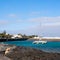 Catamaran docked in blue sea